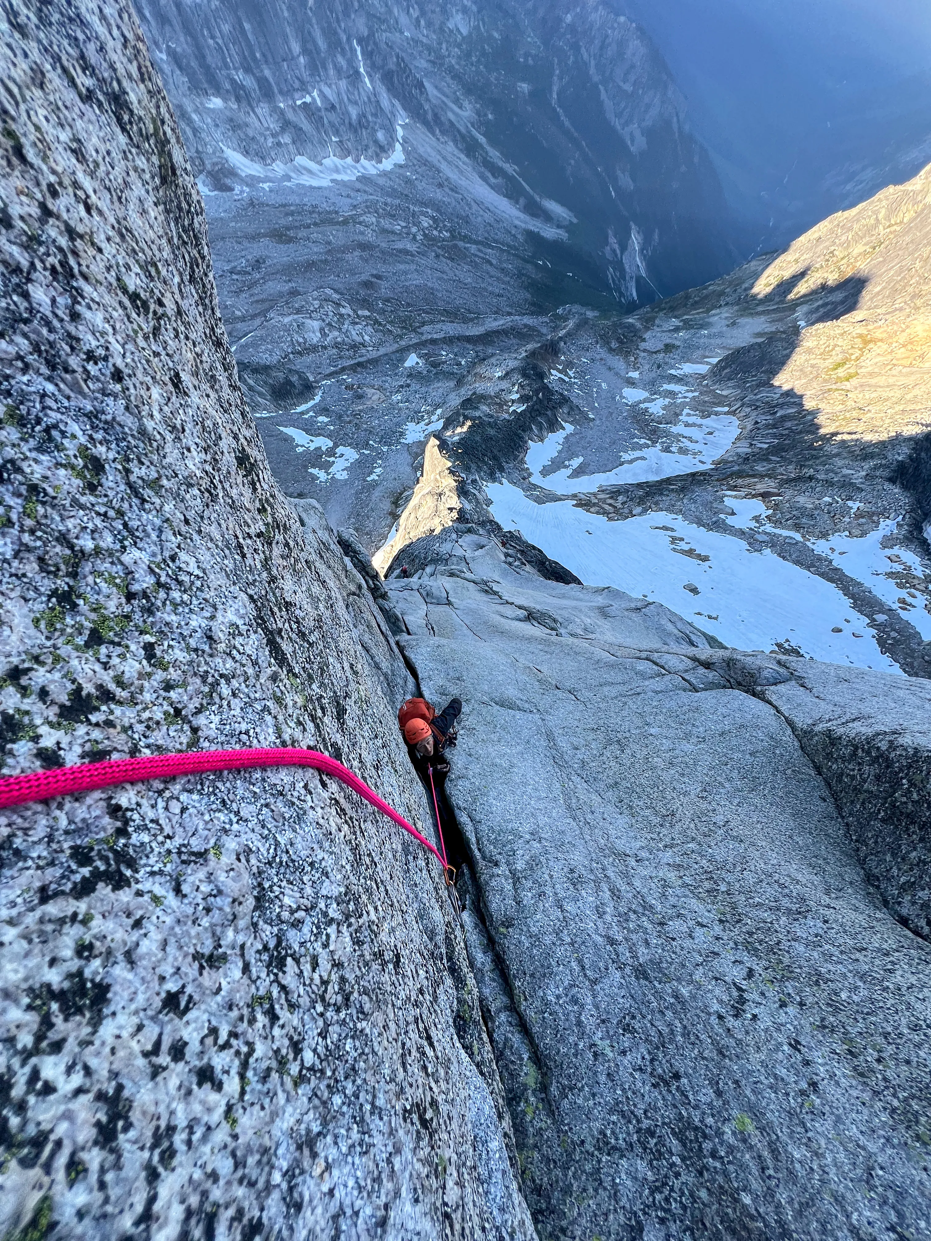 A climber following a crack in the Great Dihedral on South Howser Tower
