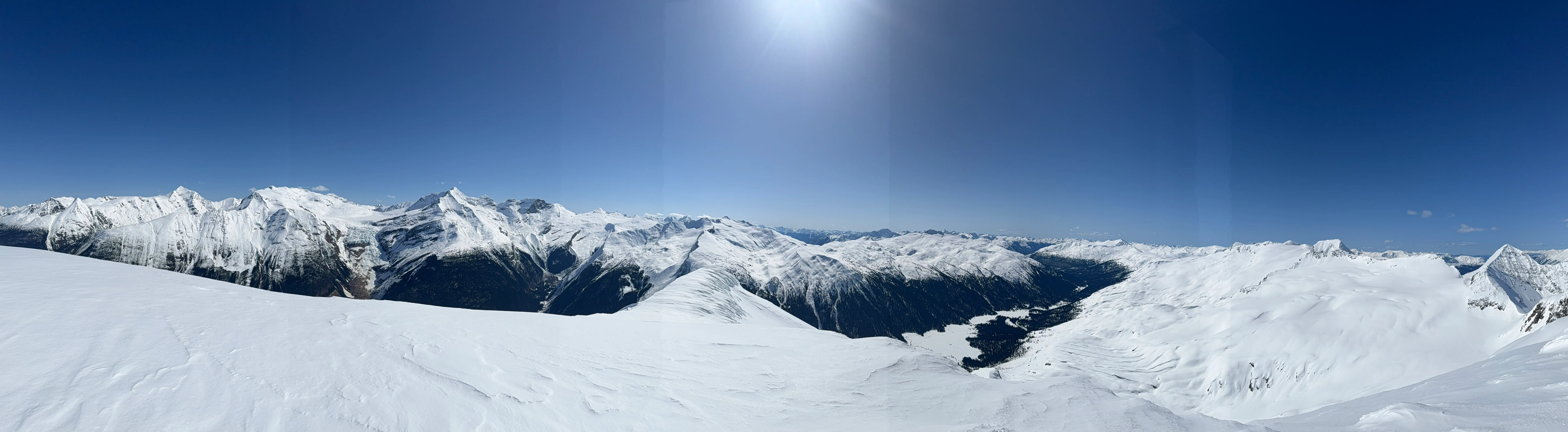 A broad view across the Cariboo Mountains from the exposed ridge above Azure Pass